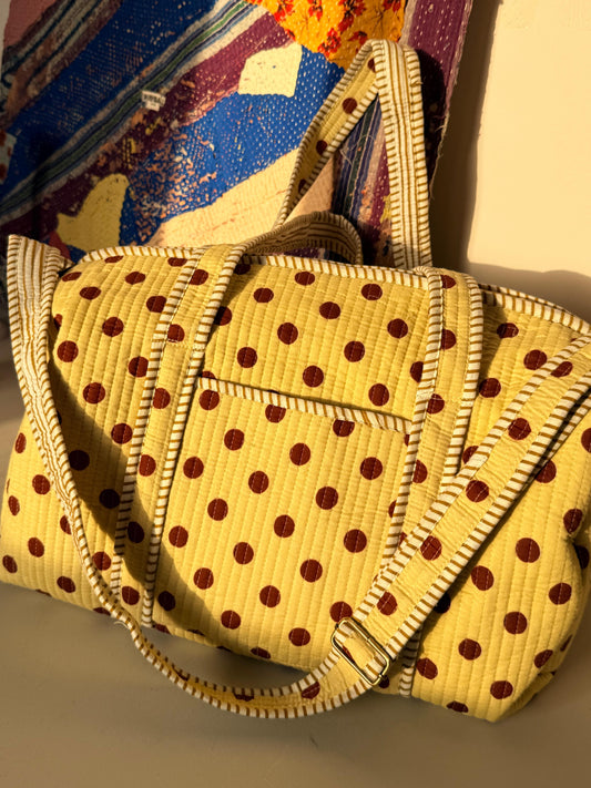 Viral polka dota duffle bags